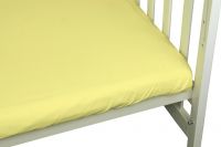 Простынь трикотаж на резинке в кроватку Руно желтая