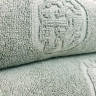 Однотонное махровое полотенце 590 г/м2 зеленое, купить